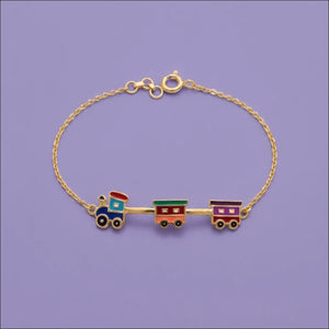 Tiny Moving Train Gold Bracelet