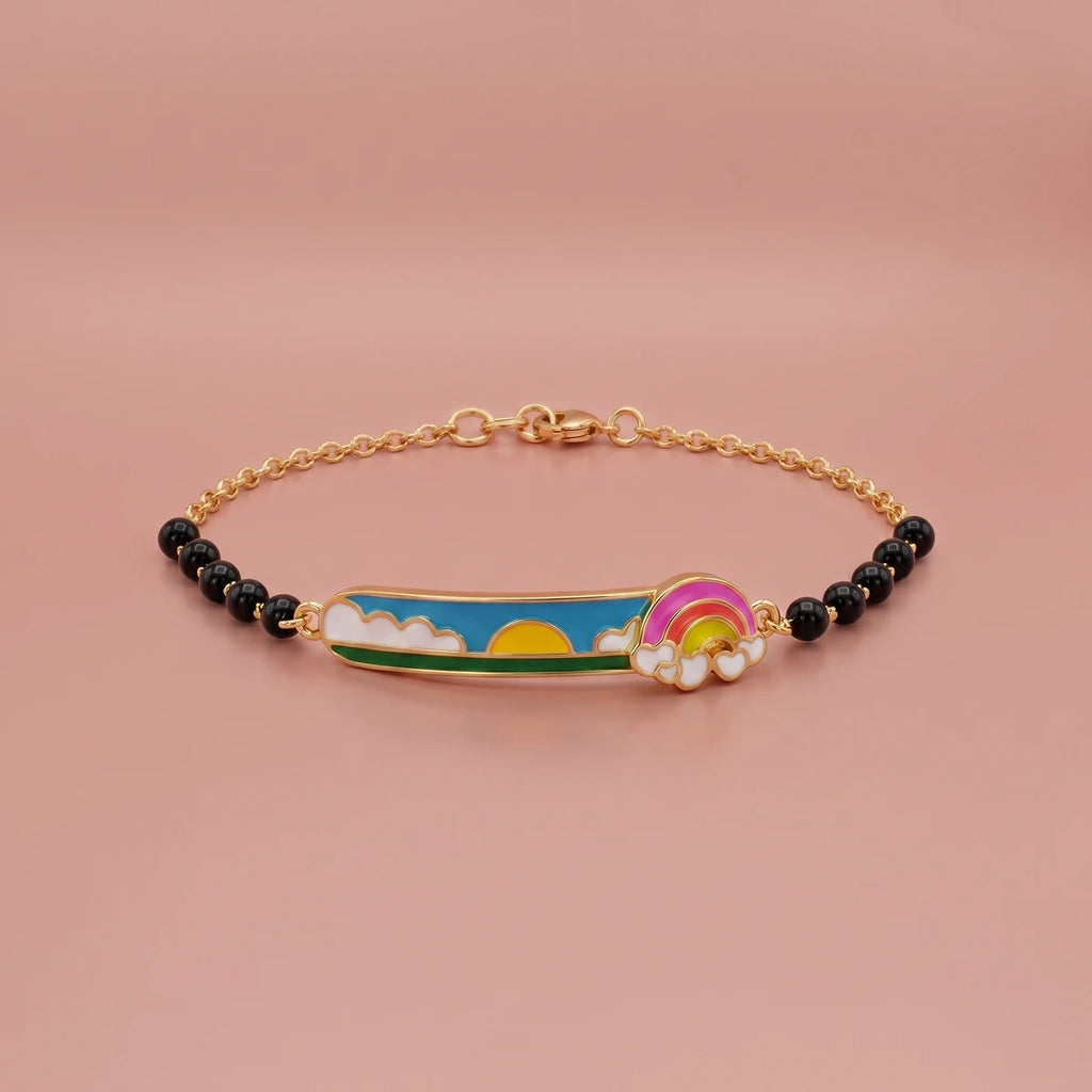 Gold kids bracelet featuring bright rainbow and cloud accents