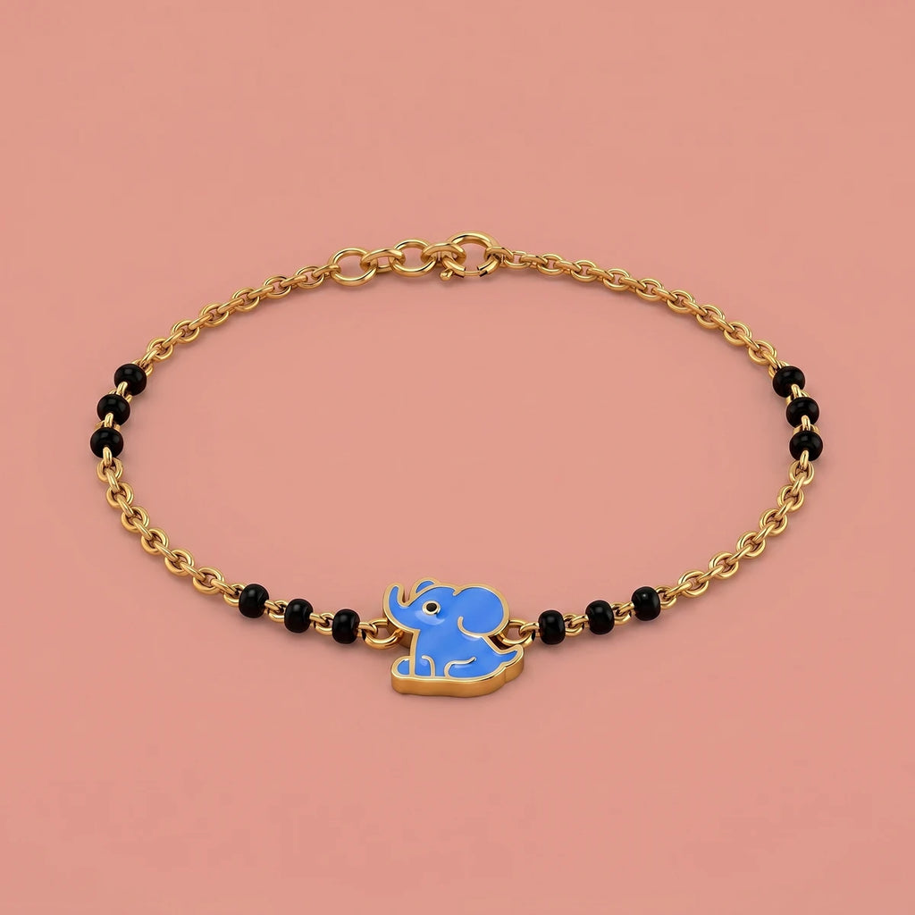 Kids gold nazariya bracelet featuring cute blue elephant charm