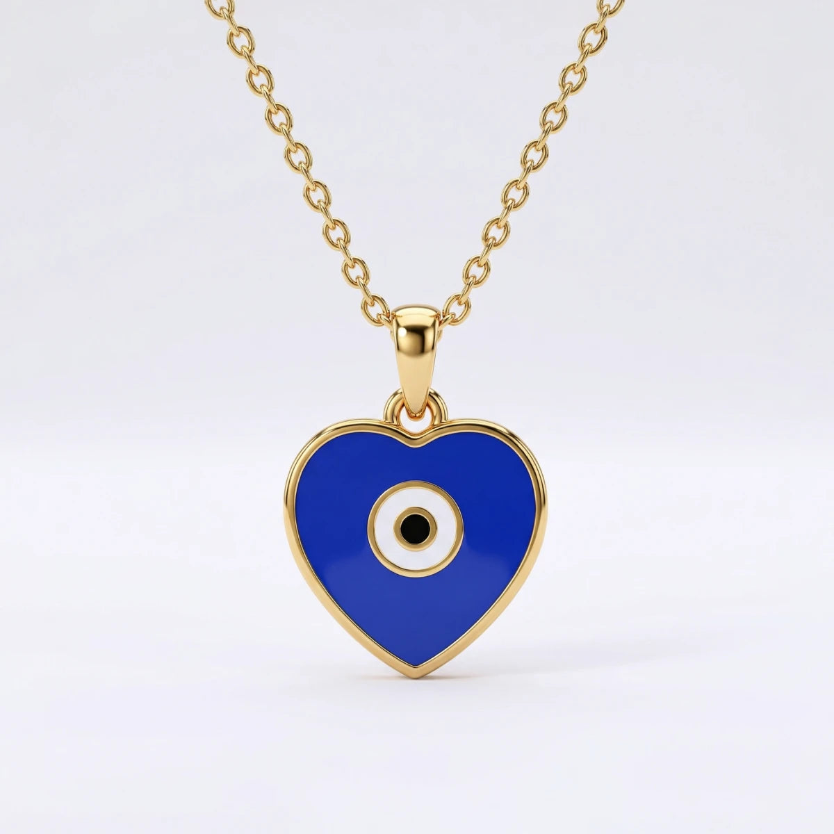 Little Guardian Heart Evil Eye Pendant | Tinyfacets | gold little guardian heart evil eye pendant jewelry